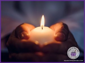 Hands gently holding a glowing candle in a dark space, symbolizing warmth and intimacy. This image highlights the serene and magical atmosphere of a candlelit choir concert theme.