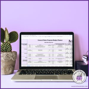 Elementary music teacher using a general music classroom budget planner on a laptop to organize supply lists, track spending, and plan purchases for the school year.