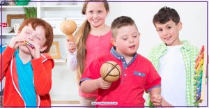 Elementary students playing classroom instruments together during hands-on learning in music class